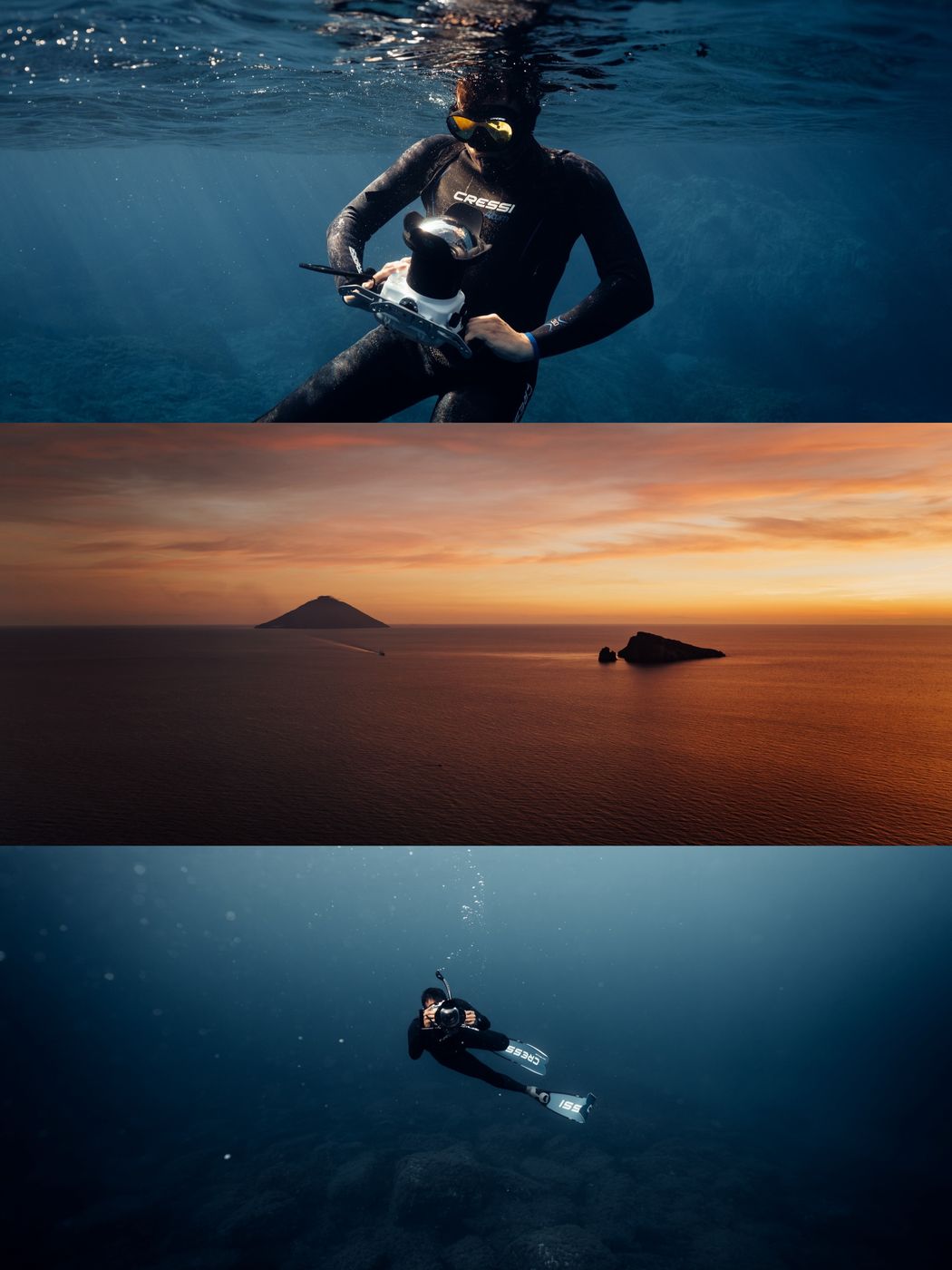 Freediver in a wetsuit holding an underwater camera