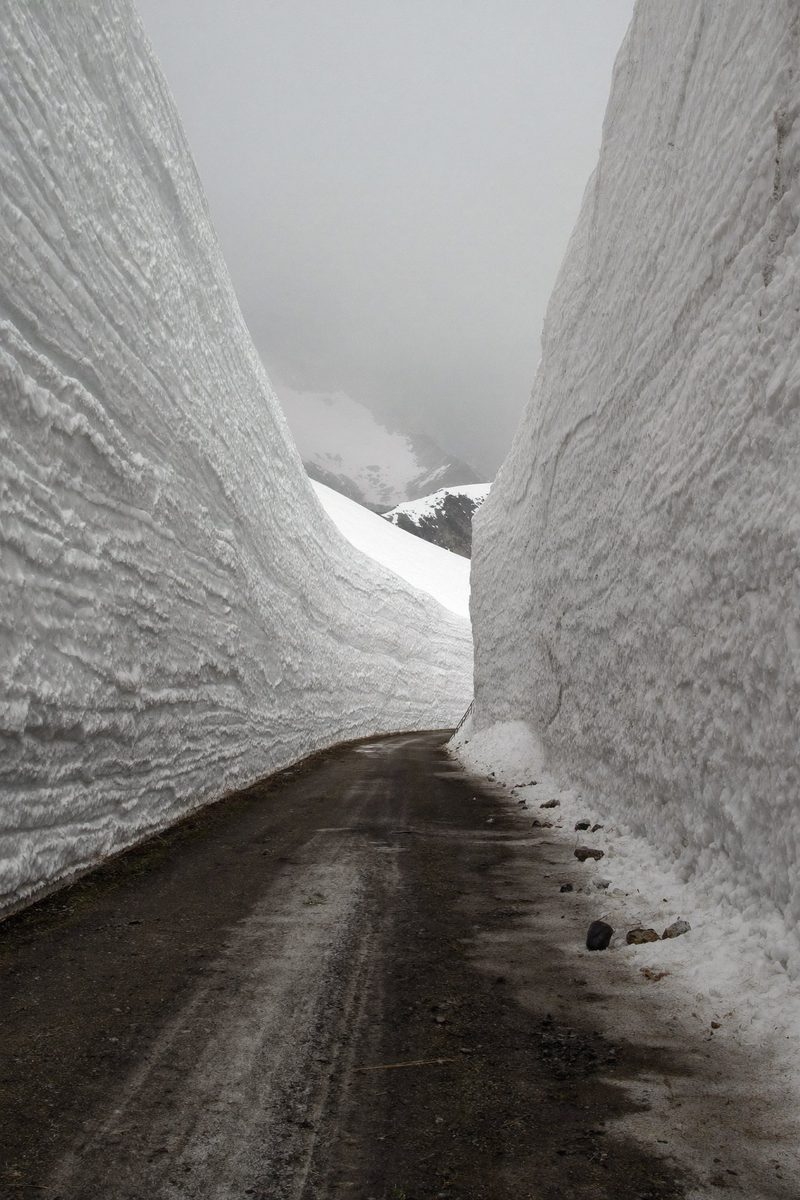 Moodboard: road between walls of snow